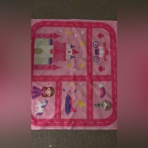 Pink little kids car play rug.